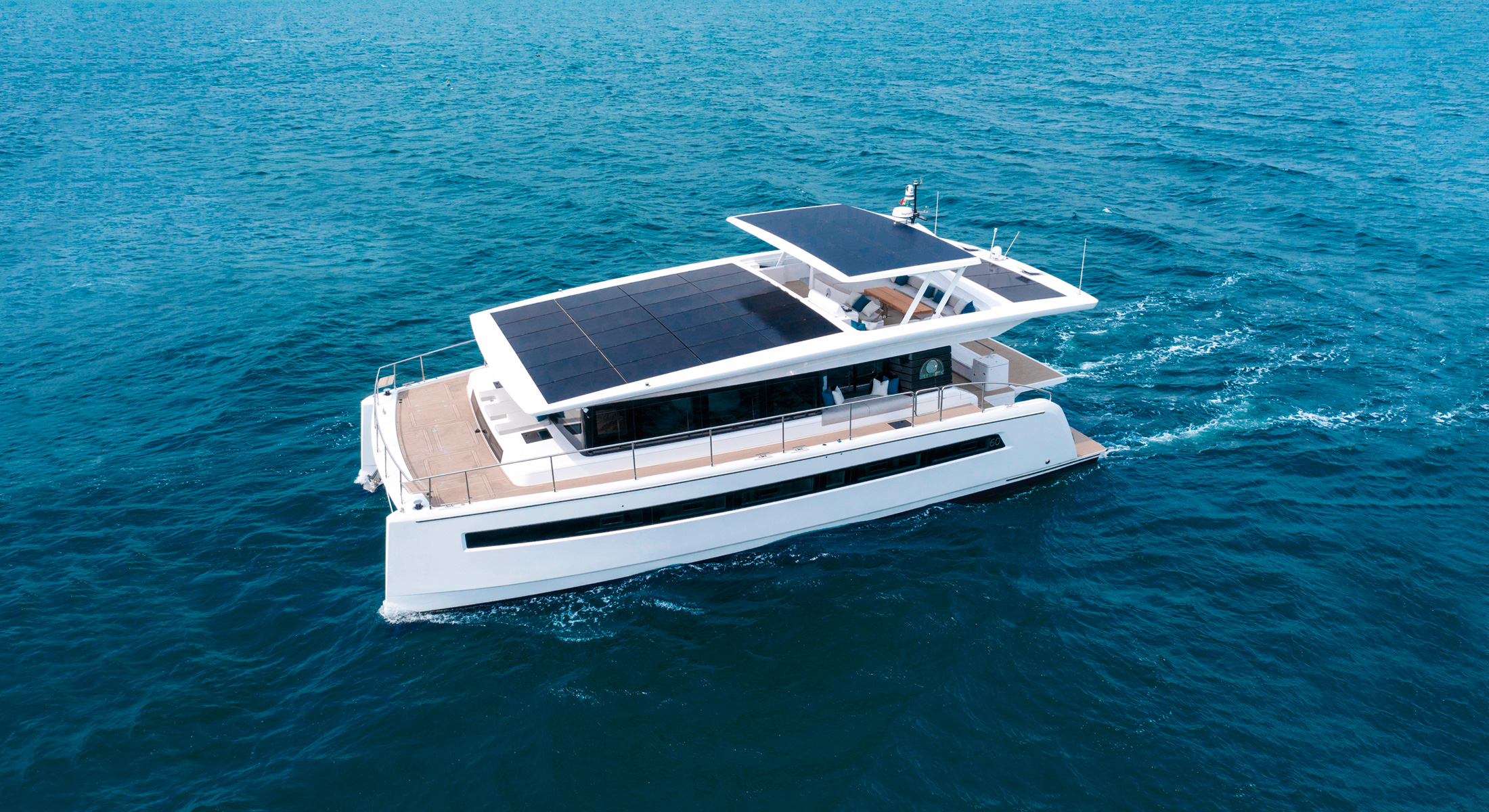 Electric catamaran with solar panels on the roof