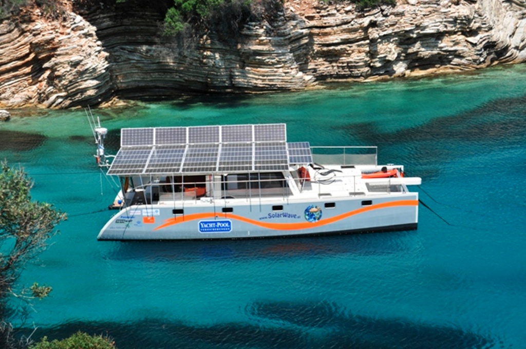 historic yacht with solar panels on the roof
